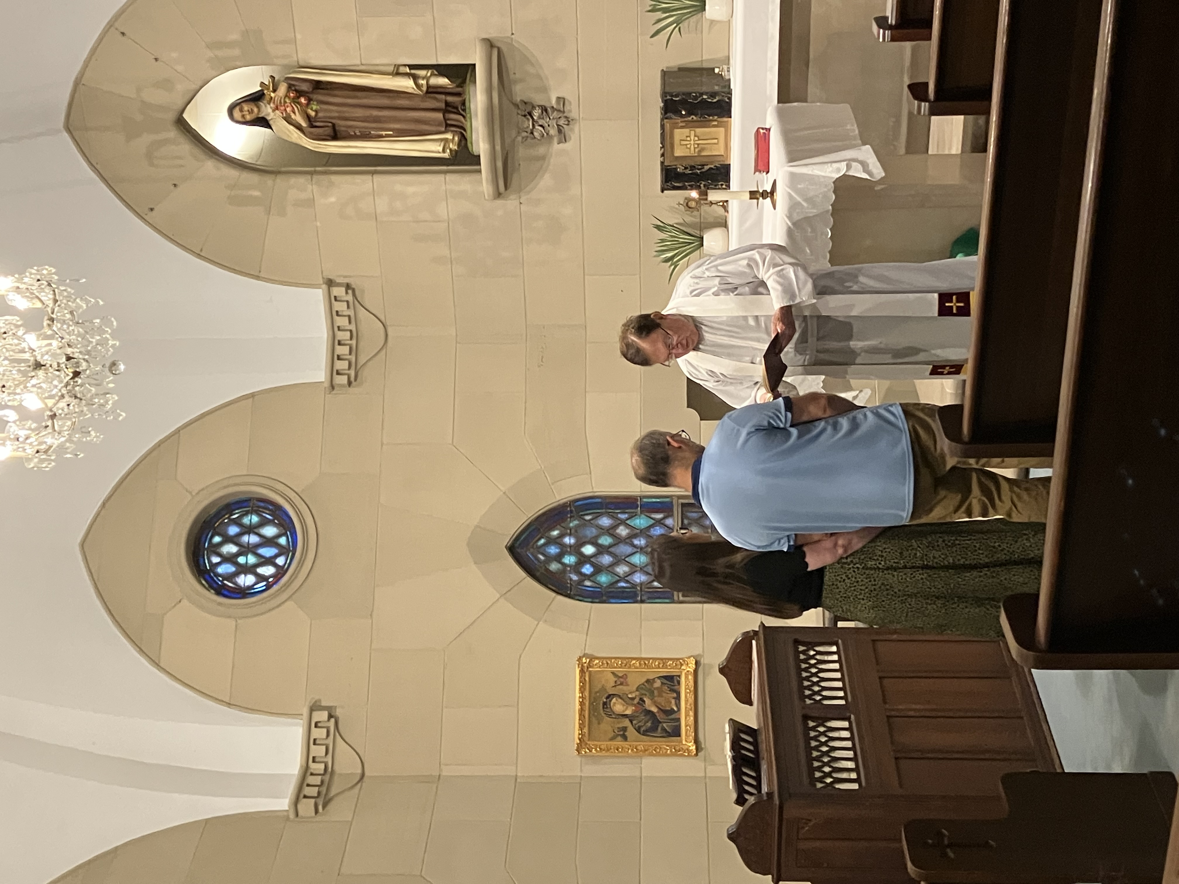 Fr. Herzog blessing a couple