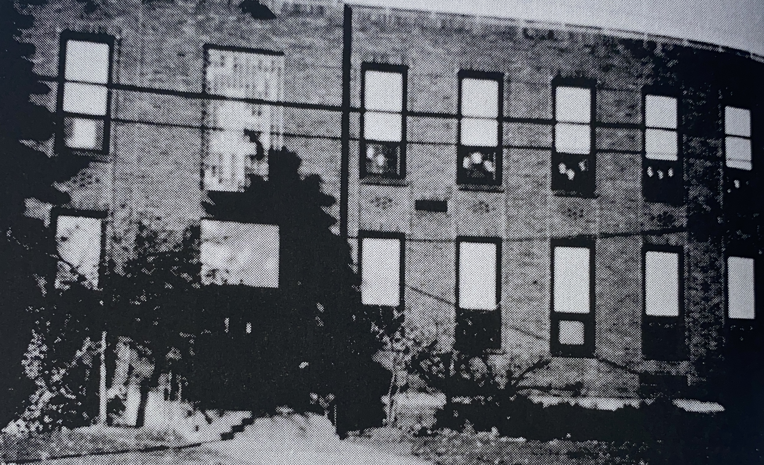 side of boone school building showing windows 