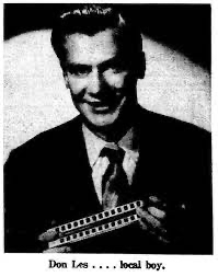 man holding harmonica smiling