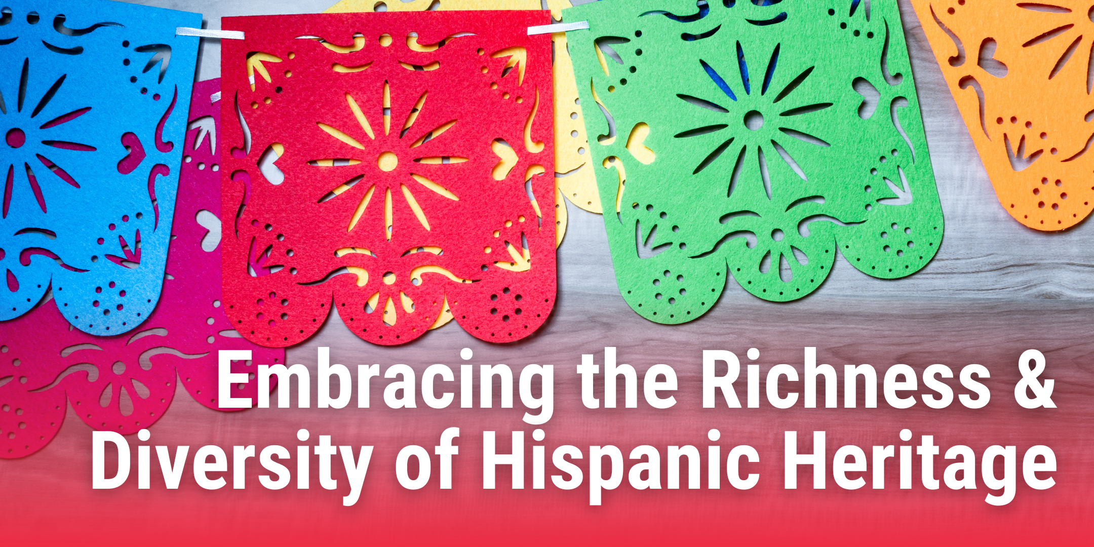 Colorful banner displaying Mexican papel picado banners. There is a text overlay displaying the blog title "Embracing the Richness and Diversity of Hispanic Heritage: Celebrating Hispanic Heritage Month".