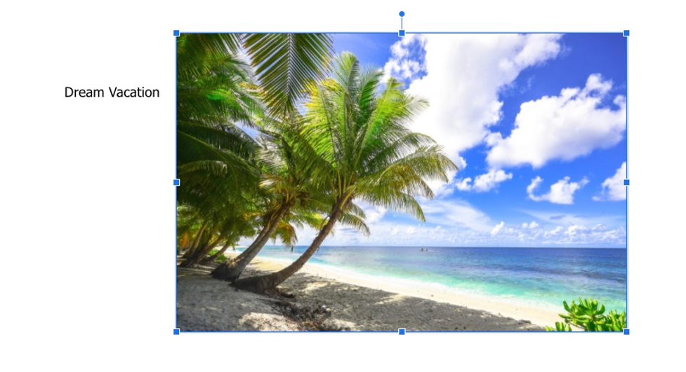 Slide showing text "Dream Vacation" next to the image of a tropical beach.
