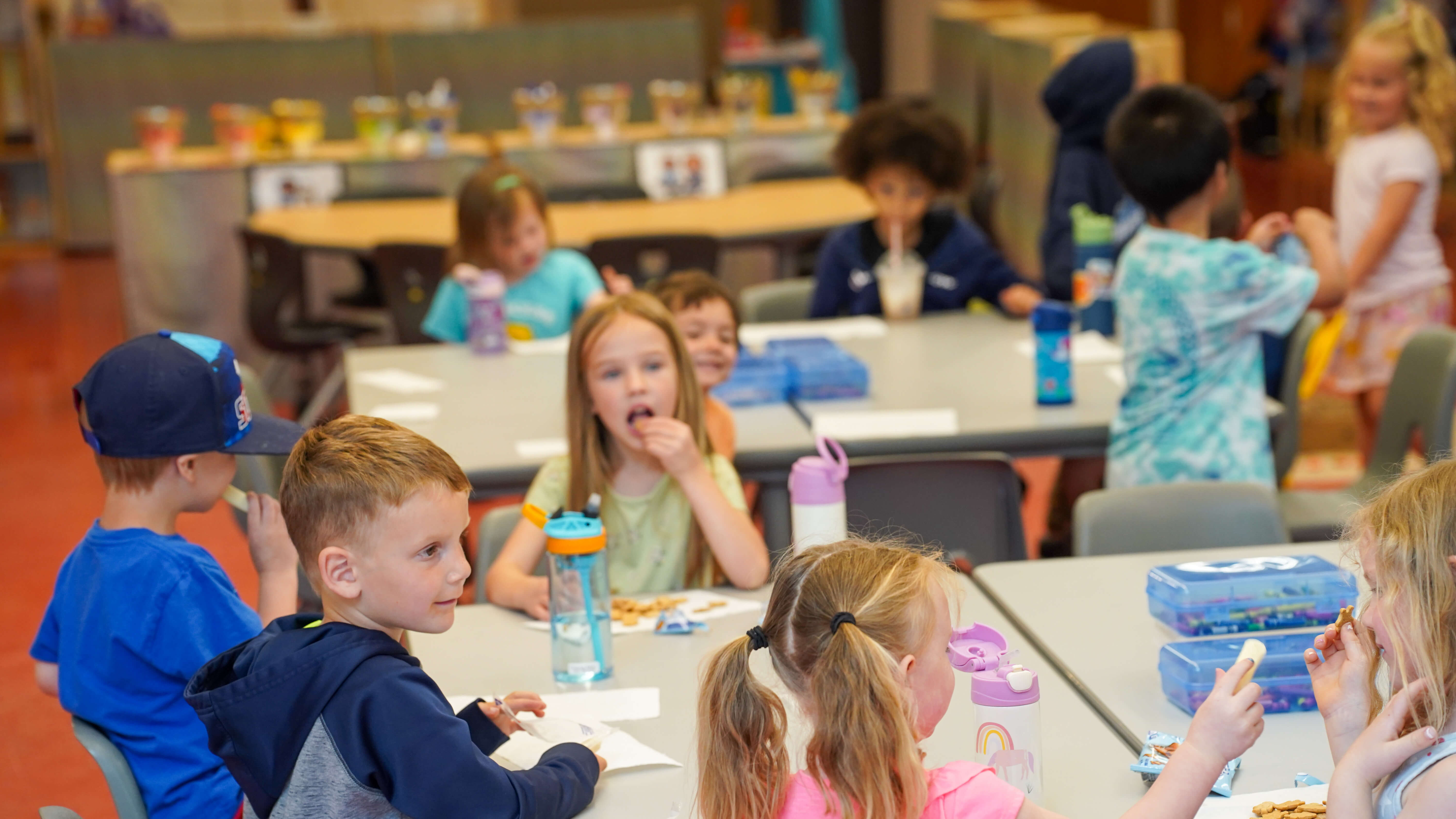 Group of preschoolers eating snacks