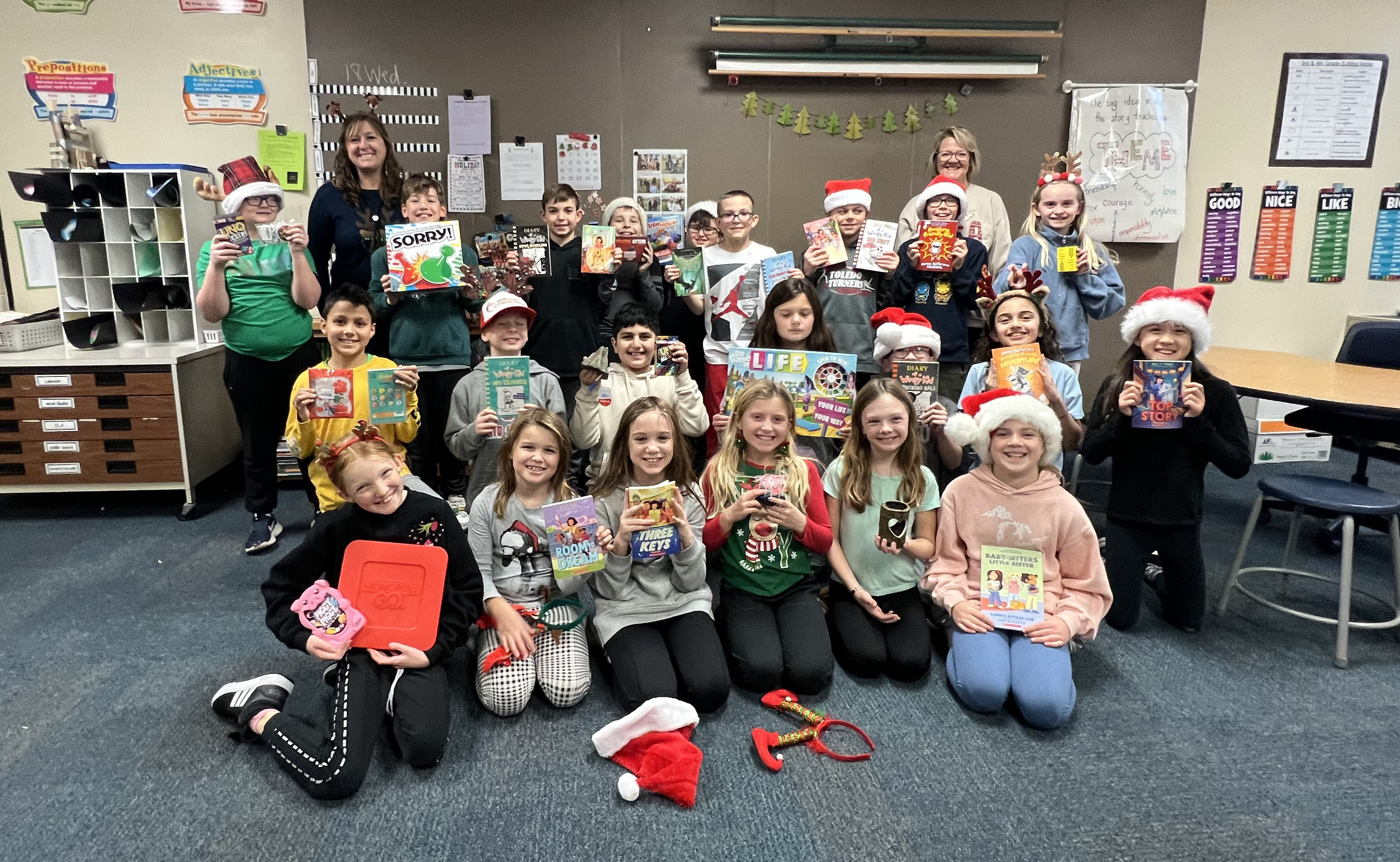 mrs black and her fourth grade class present check to amy barrett