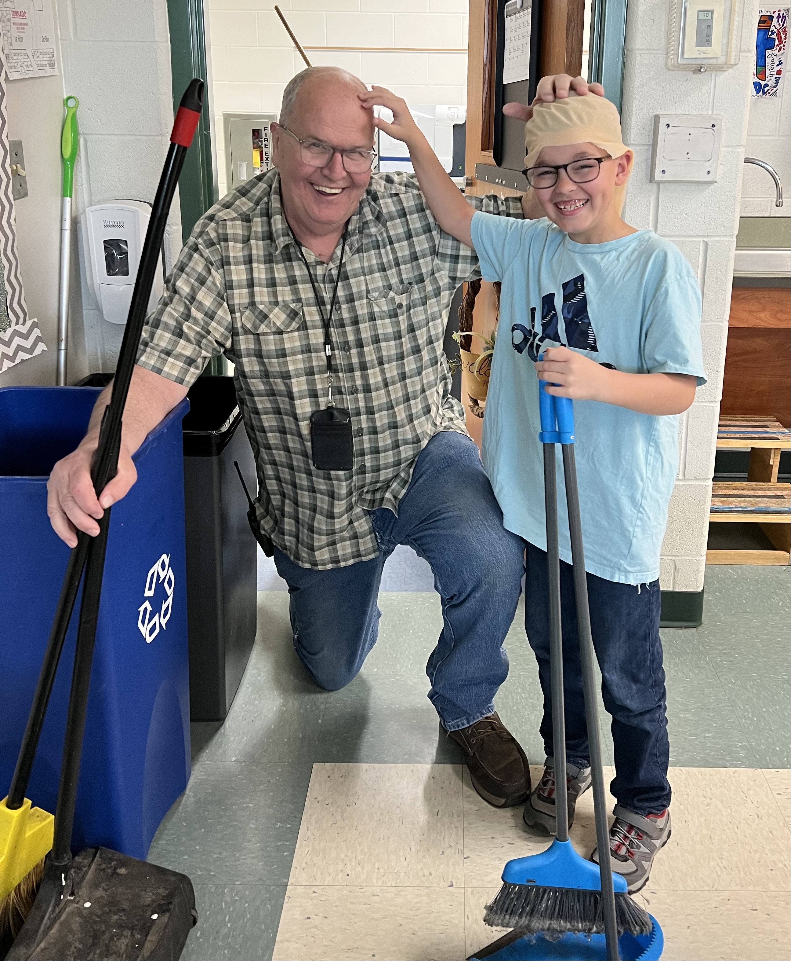Dan Gallagher-custodian with a student who dressed up like Dan