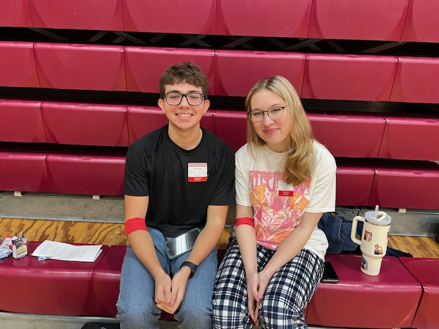 Two students pictured after a successful donation.