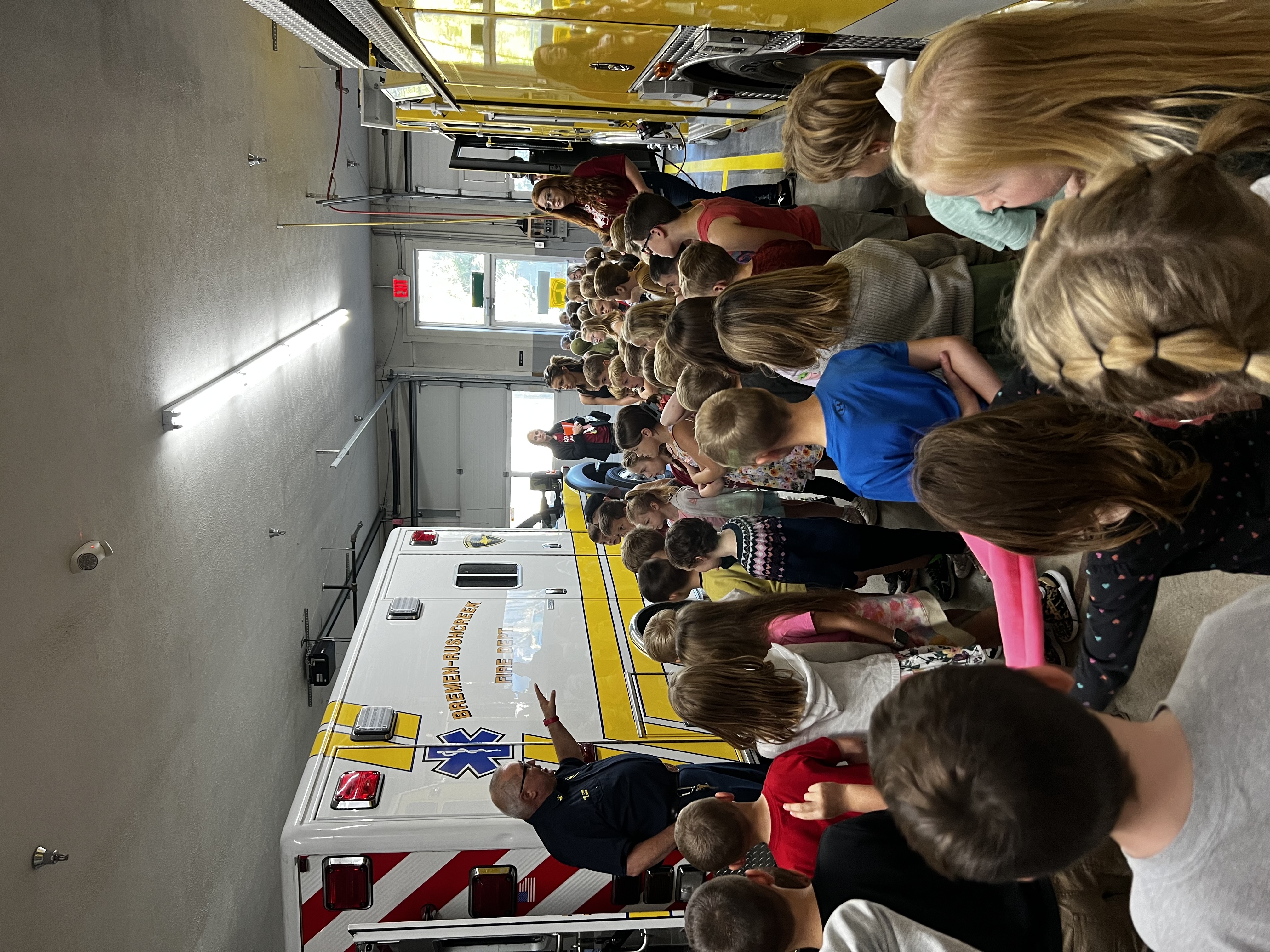 Students pictured at the firehouse