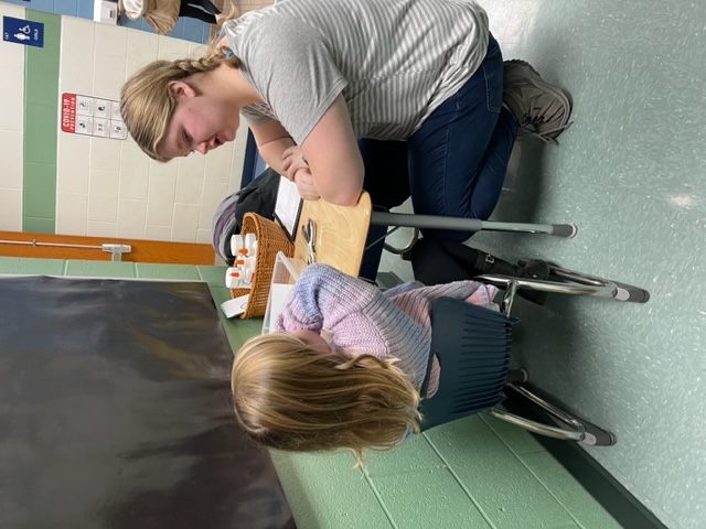 FCS student works with a Kindergarten student.