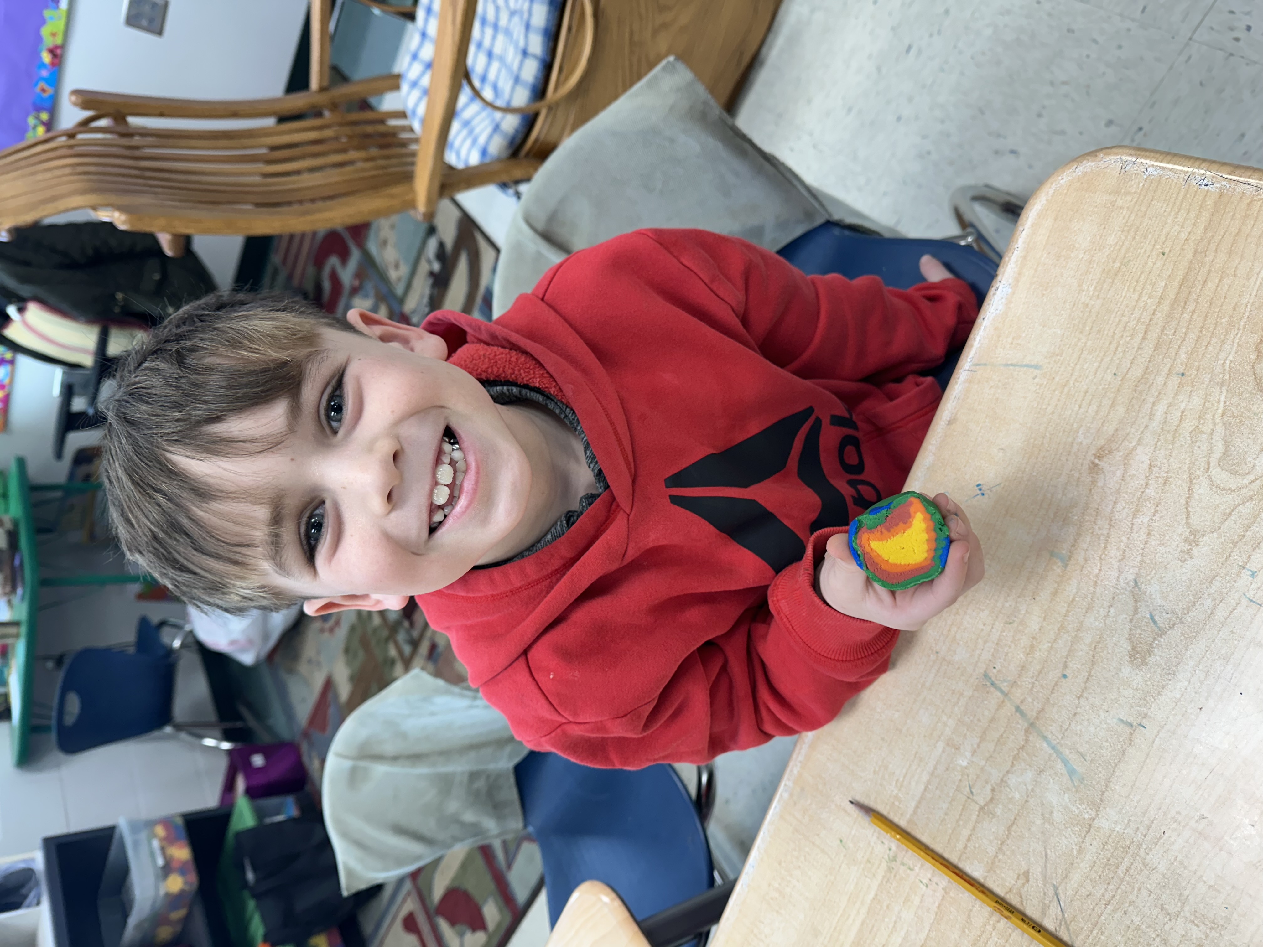 One of Mrs. Neal's students with his Earth model.