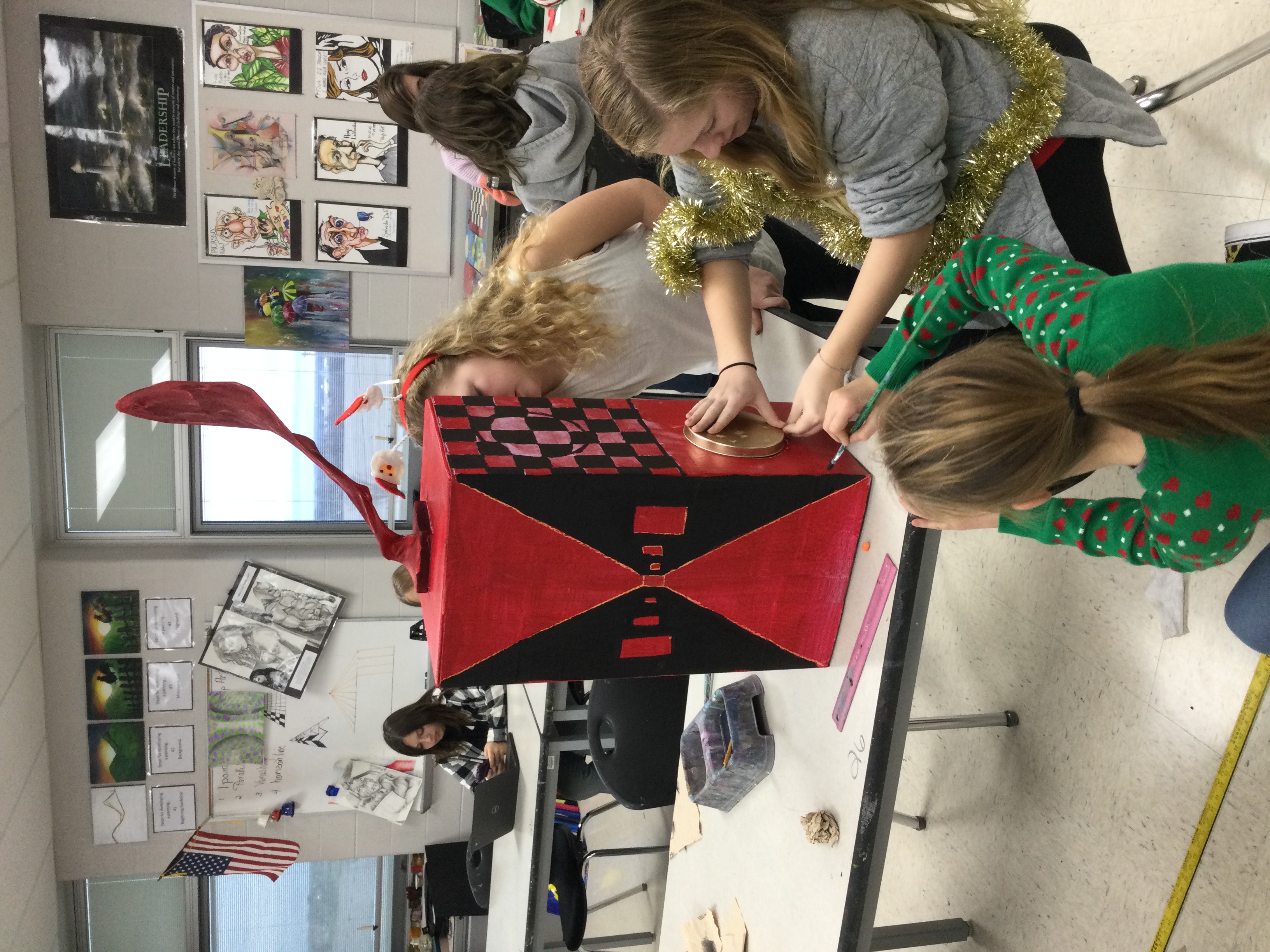 Creativity abounds in art club when students create the Reindeer Games Trophies.