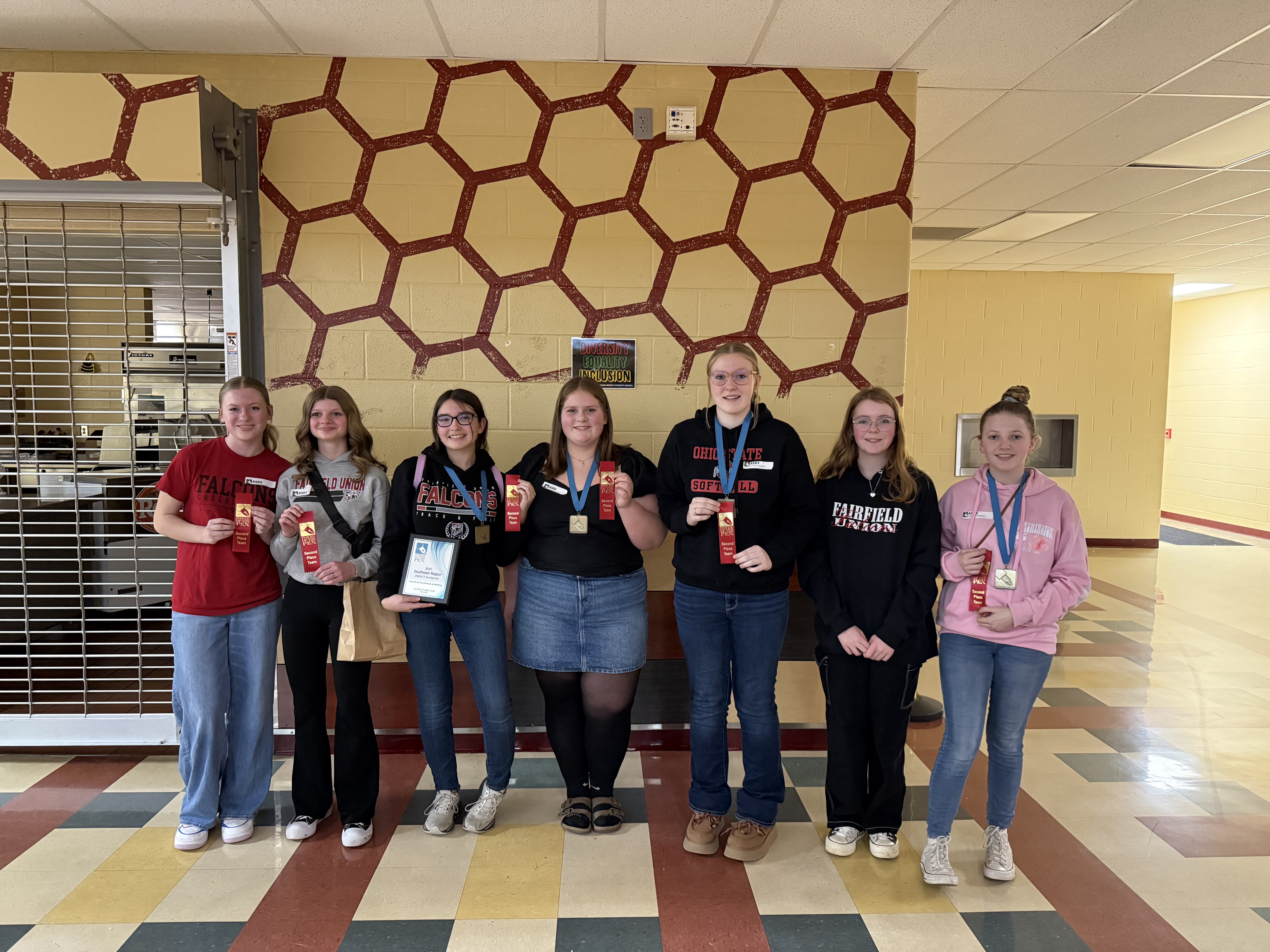 Team members pictured with their awards.