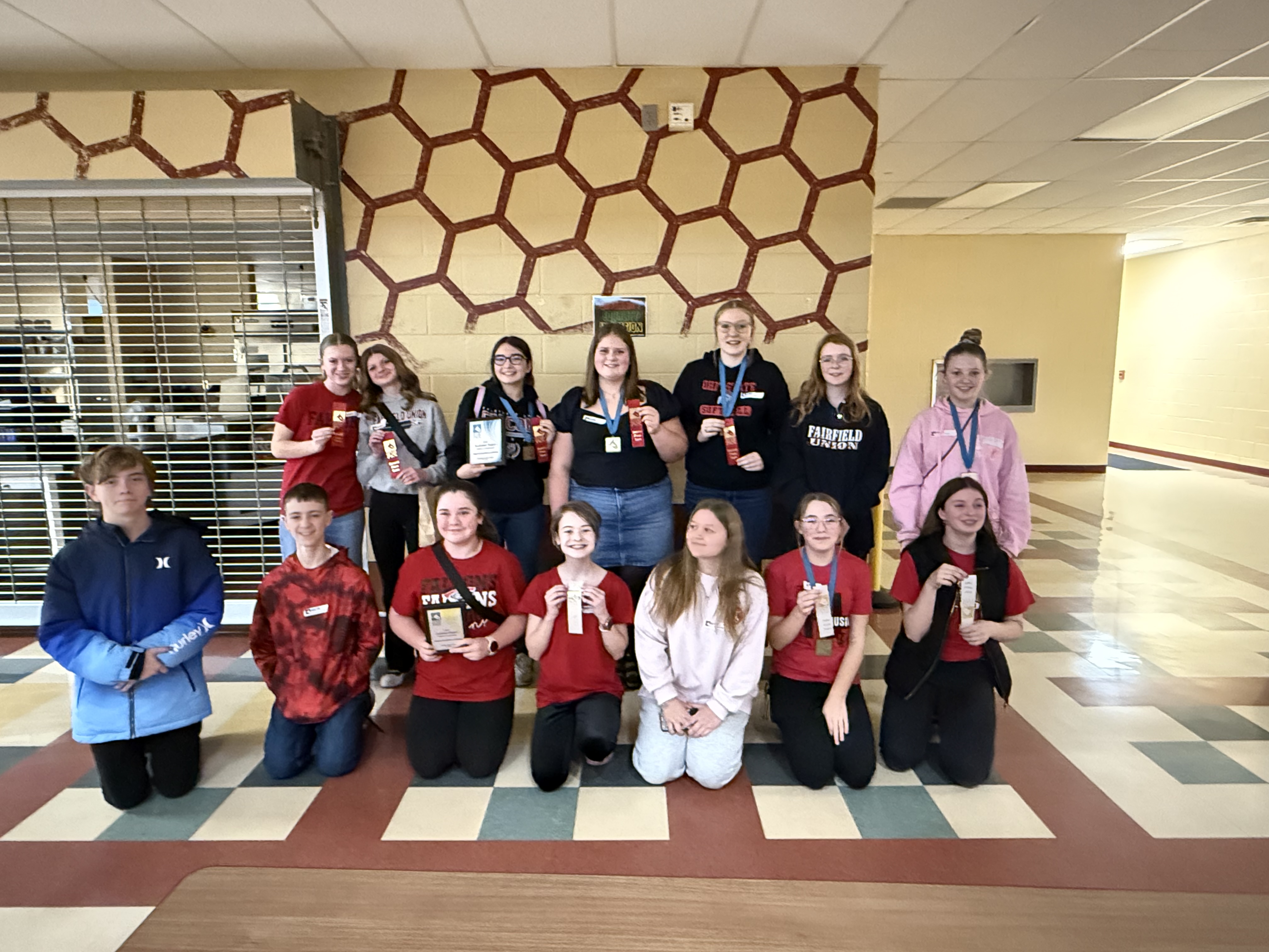 Power of the Pen Team Members pictured with their awards.