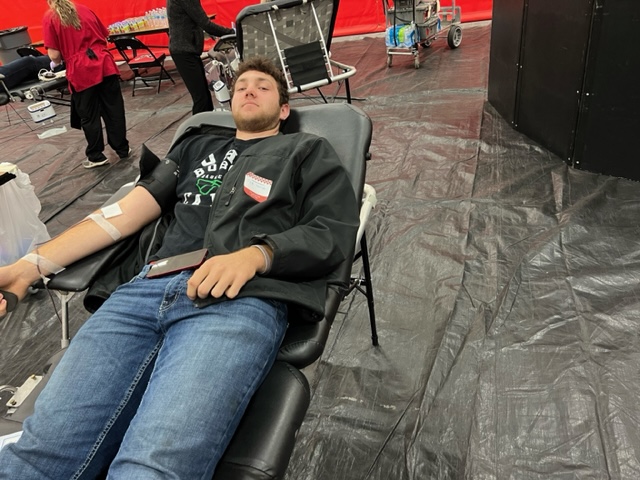 Student donating blood.