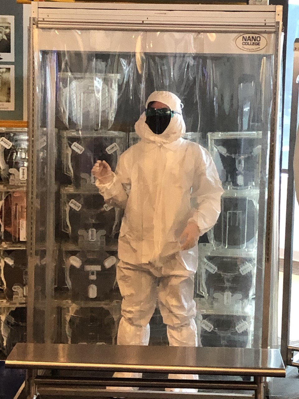 Student in a cleanroom and cleanroom protection