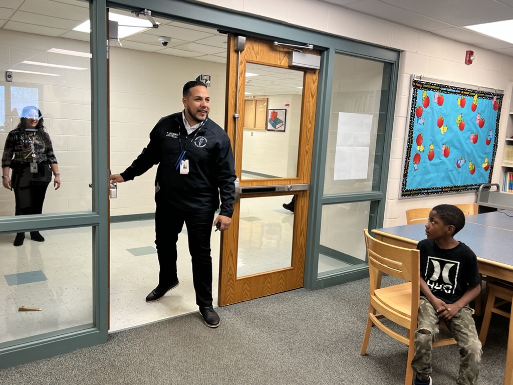 Lorain Schools’ Director of Safety and Security, Reuben Figueroa reassures students Thursday following a safety drill at Toni Morrison Elementary School
