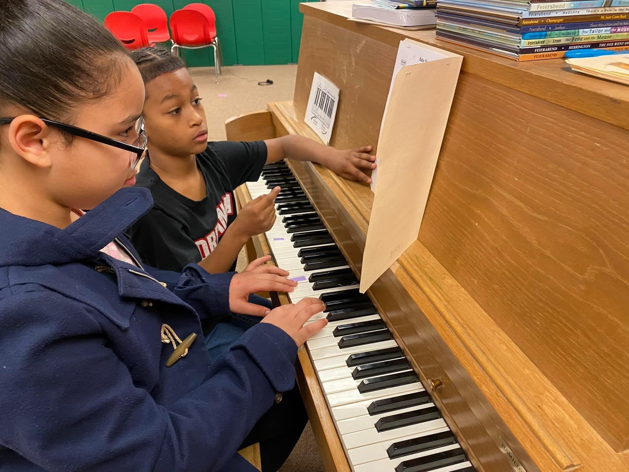 Future pianist in “training”! Meet Ruben, a Dohanos 4th grader who has taken to the piano. He is mentoring his peers and motivating them to keep trying! 